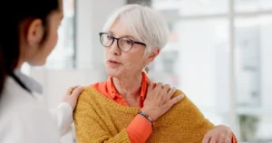 patient discussing a possible labral tear with a surgeon.