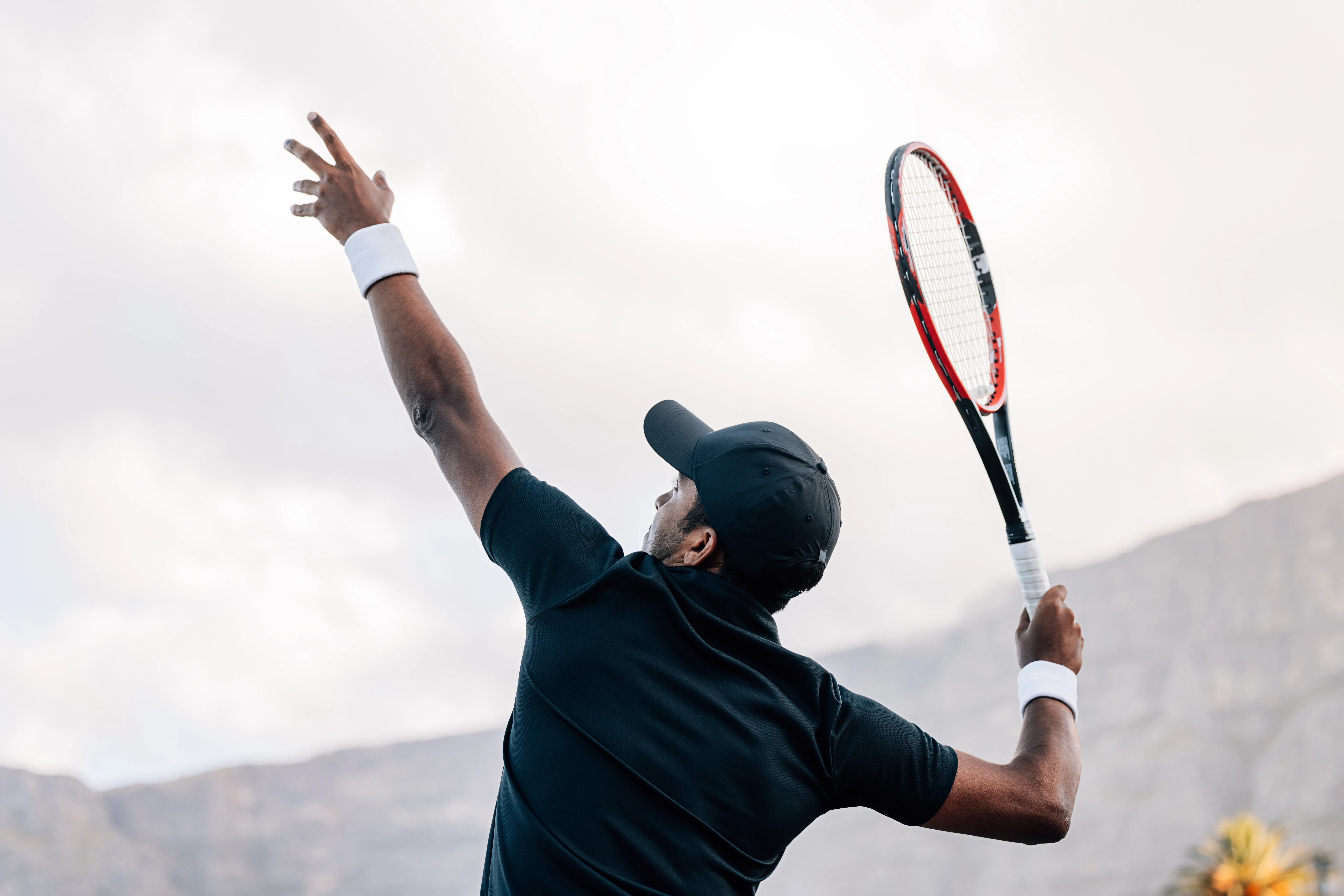 Someone playing sports before an injury.